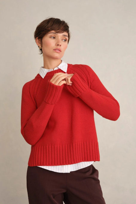Woman in red jumper