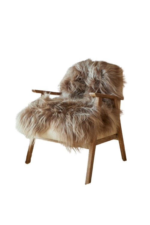 Sheepskin rug on chair