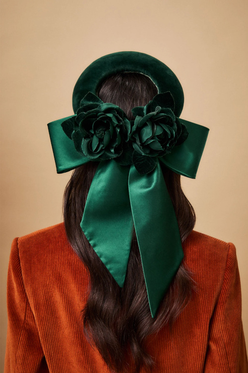 Woman wearing green ribbon hat