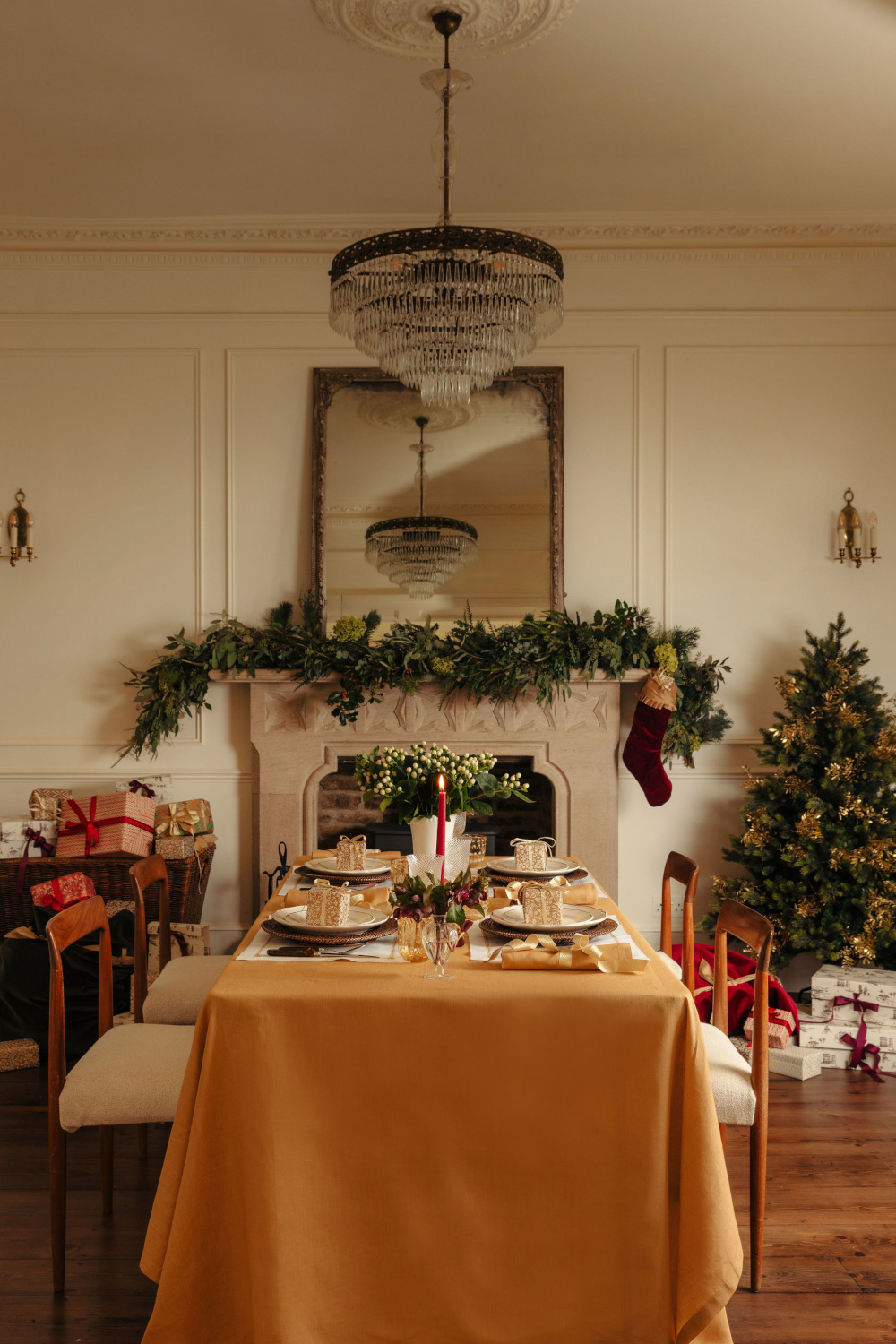 Festive setting in living room with table and fireplace