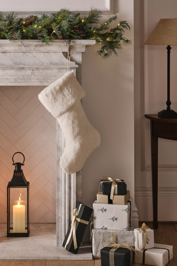 White stocking hung on mantel