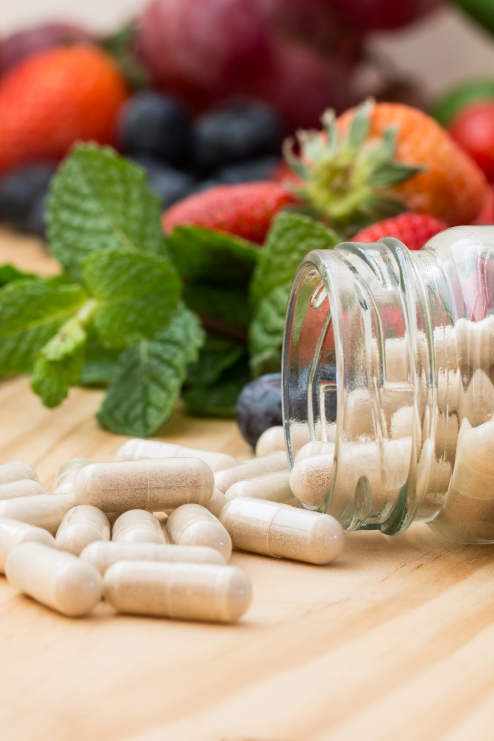 Bottle of supplements with fruit