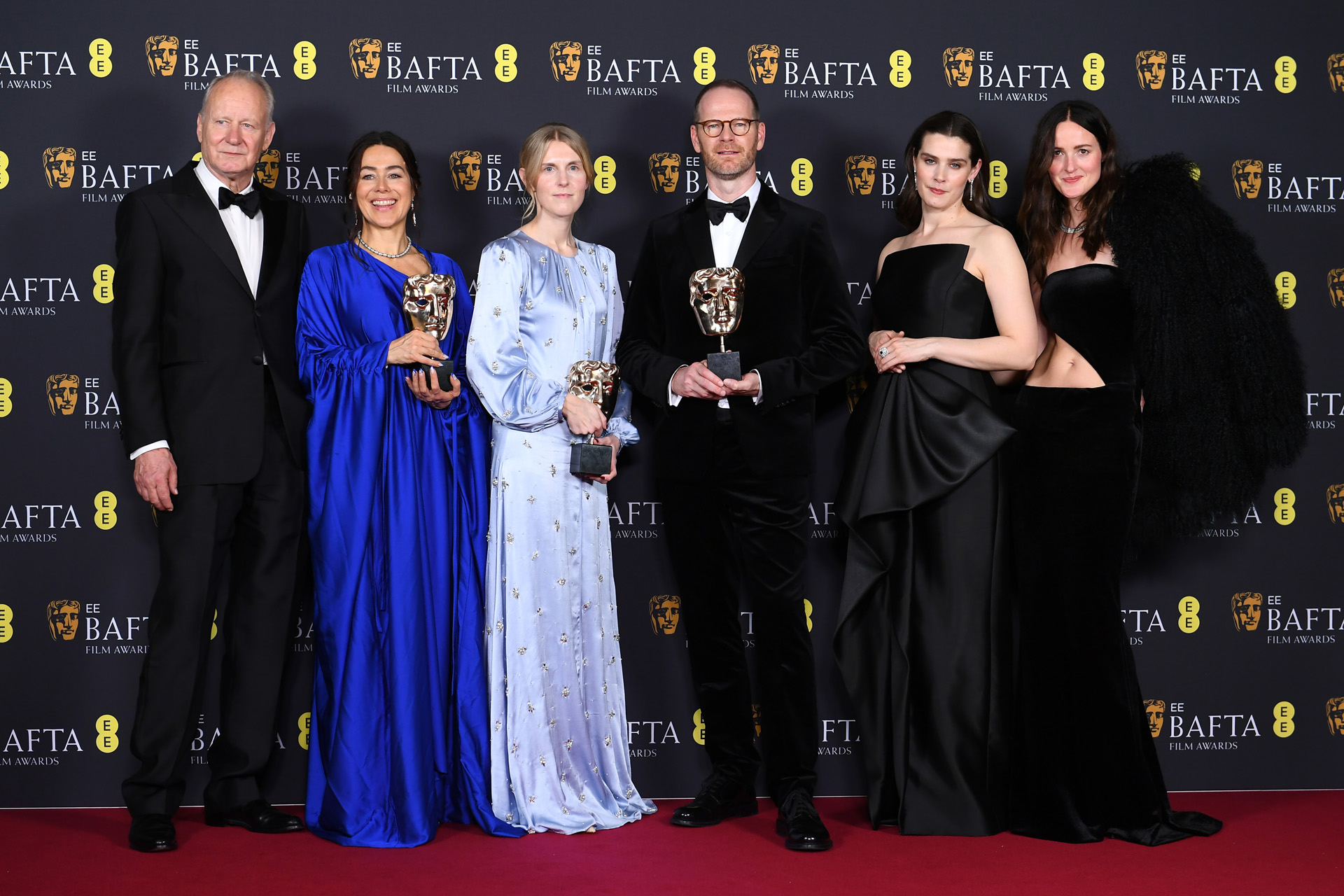 Stellan Skarsgård, Maria Ekerhovd, Andrea Berentsen Ottmar, Joachim Trier, Inga Ibsdotter Lilleaas and Renate Reinsve with the Film Not in the English Language Award for 'Sentimental Value' during the EE BAFTA Film Awards 2026