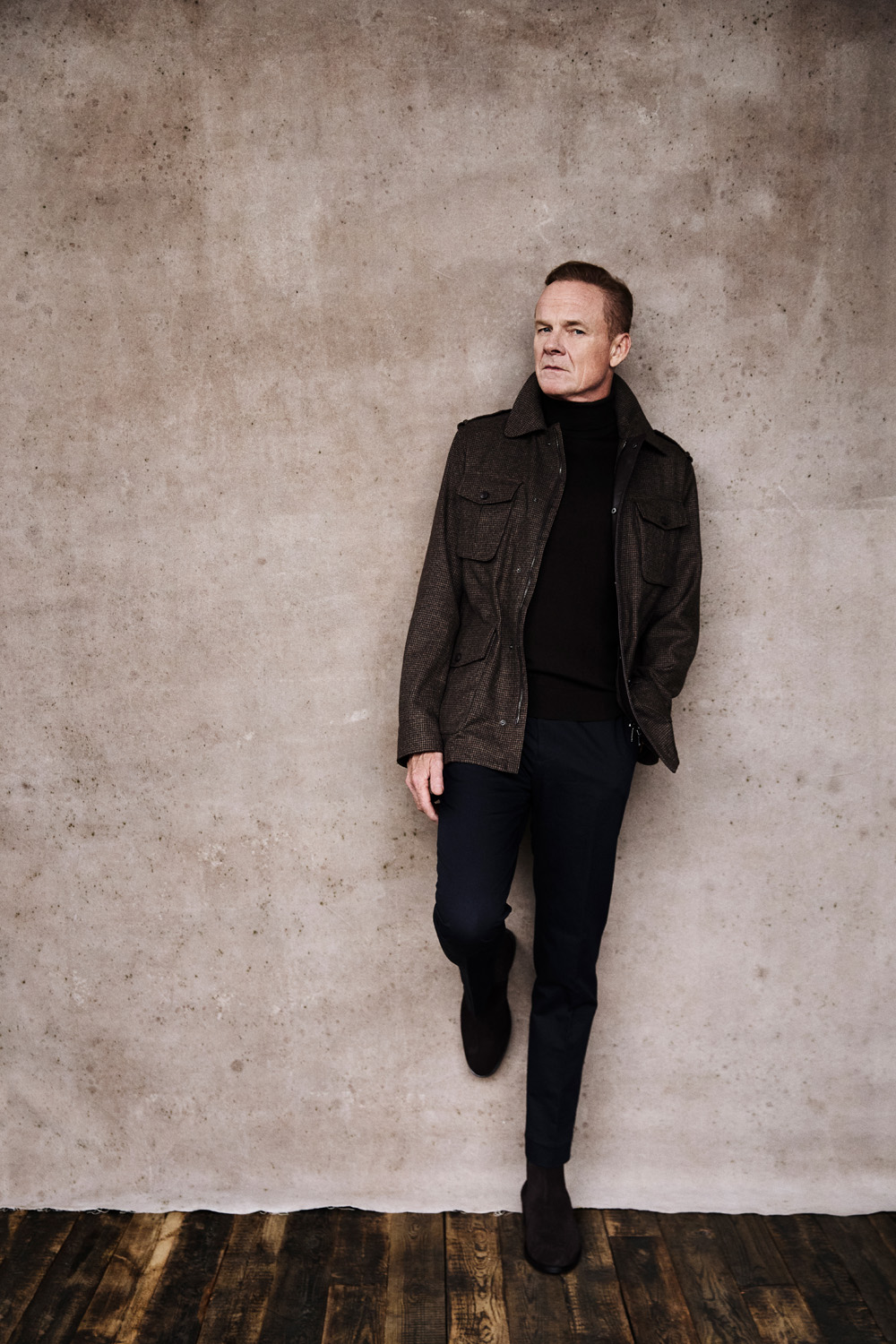 Alistair Petrie leaning against a wall