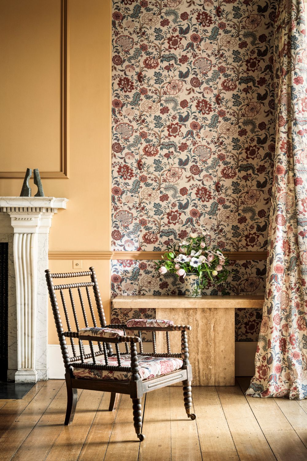 Room with yellow and floral walls