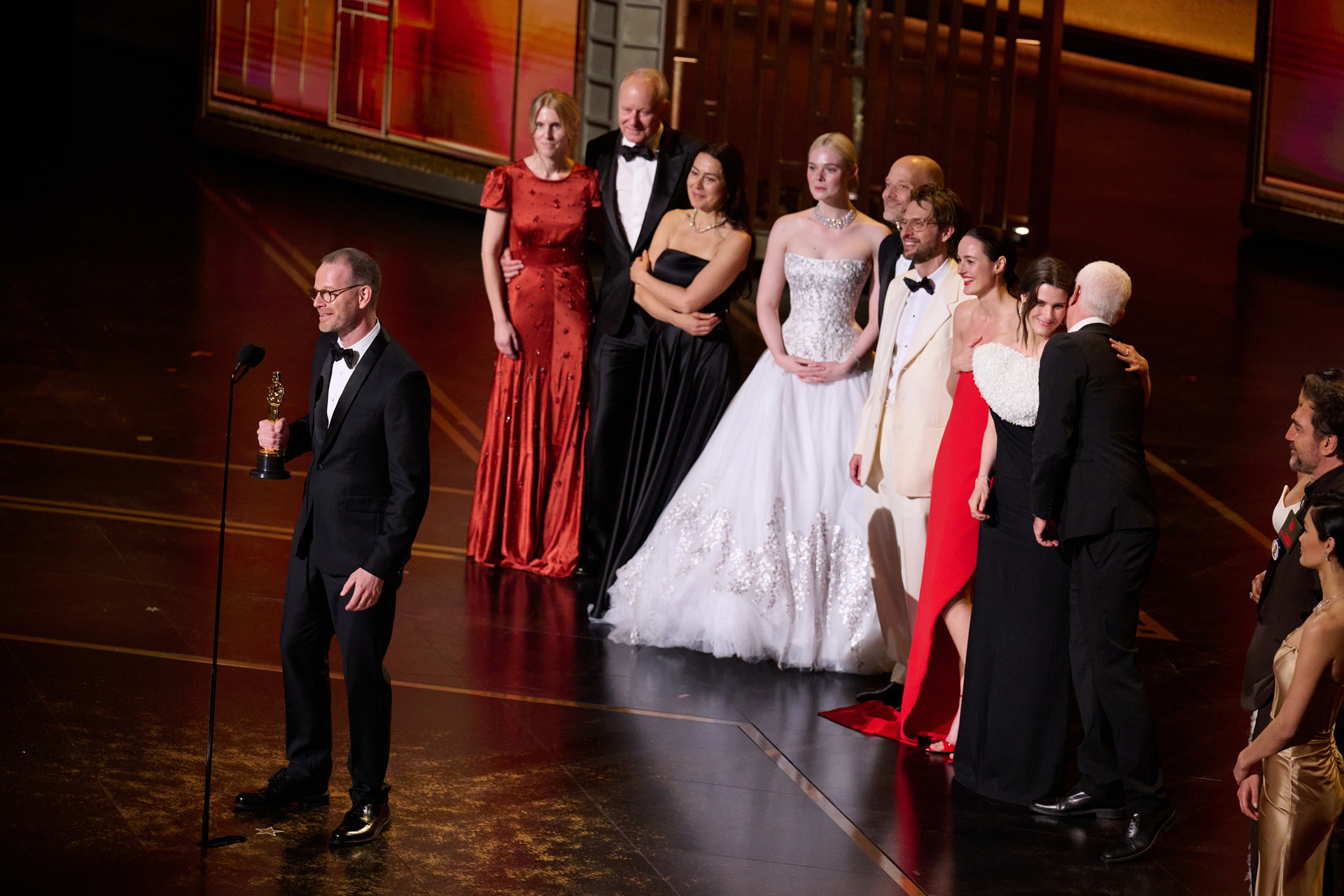 Joachim Trier accepts the Oscar® for International Feature Film during the 98th Oscars® at the Dolby® Theatre at Ovation Hollywood on Sunday, March 15, 2026 with Andrea Berentsen Ottmar, Stellan Skarsgård, Maria Ekerhovd, Elle Fanning, Eskil Vogt, Anders Danielsen Lie, Renate Reinsve, Inga Ibsdotter Lilleaas, and Olivier Bugge Coutté.