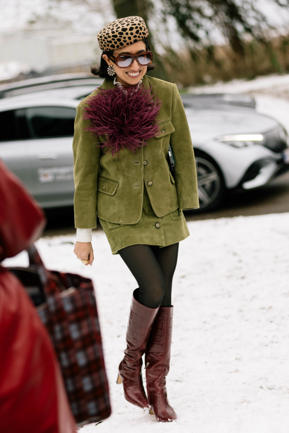 Woman in matching skirt and jacket | copenhagen fashion week street style