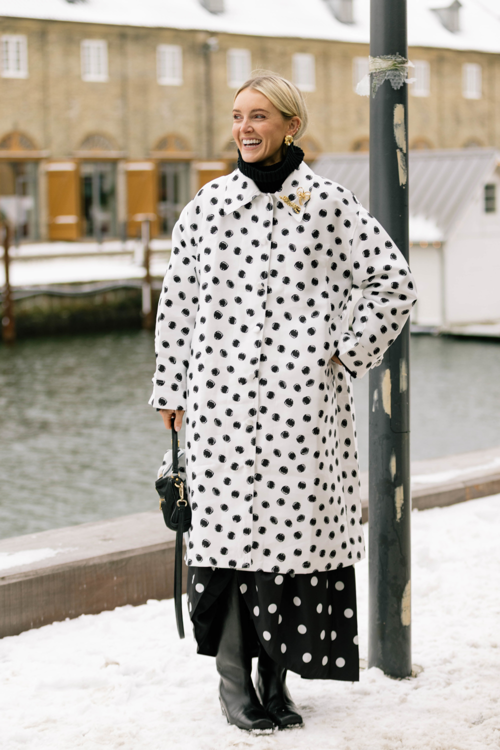 Woman in polka dot coat | copenhagen fashion week street style