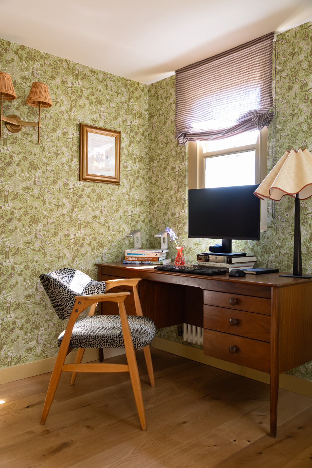 Home office with green wallpaper