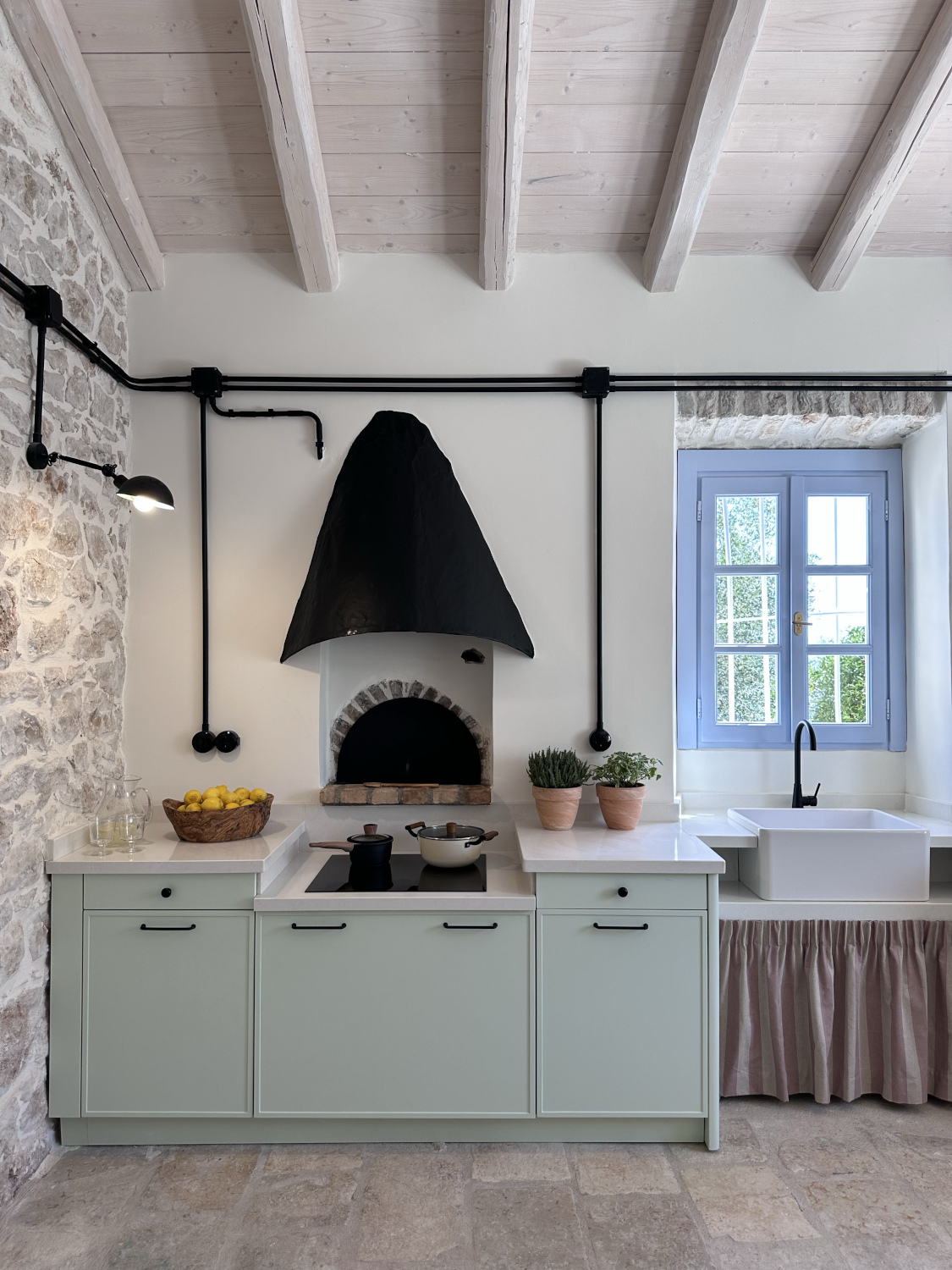 Kitchen with blue cupboards