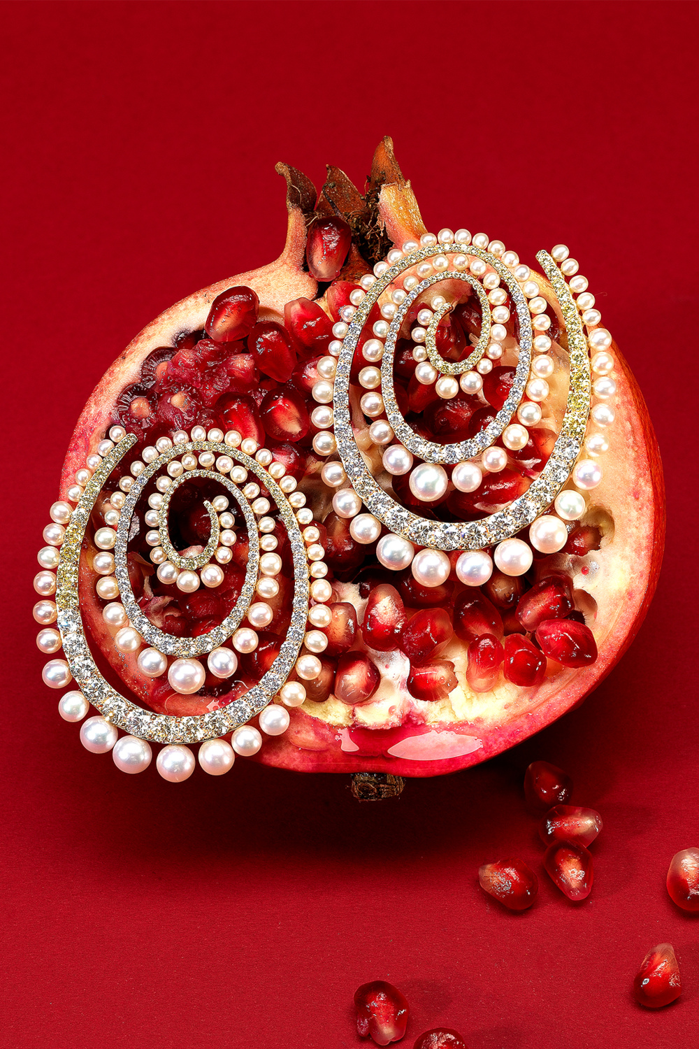 Spiral earrings on pomegranate