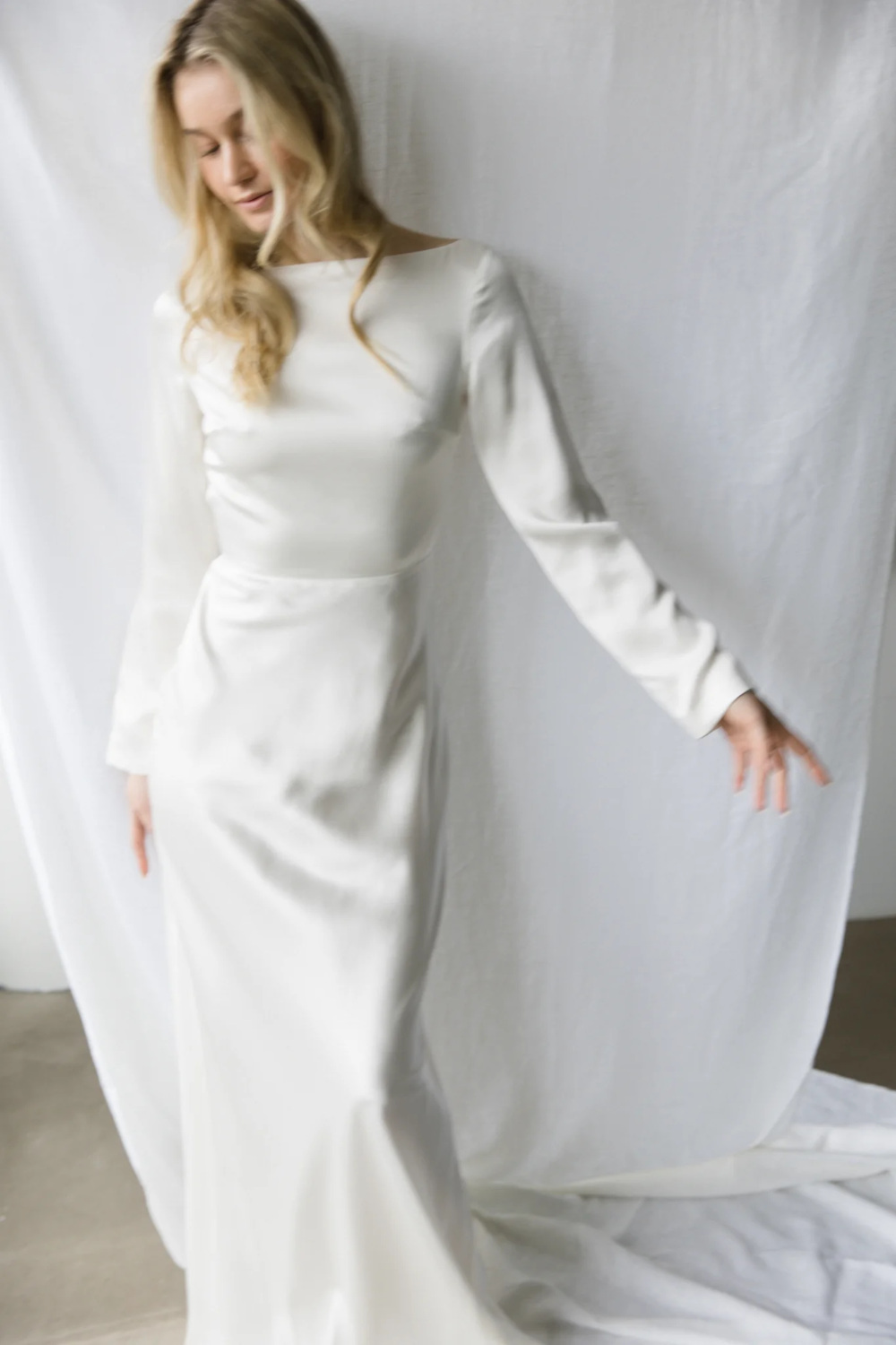 Woman in dress by British wedding dress designer Clover London