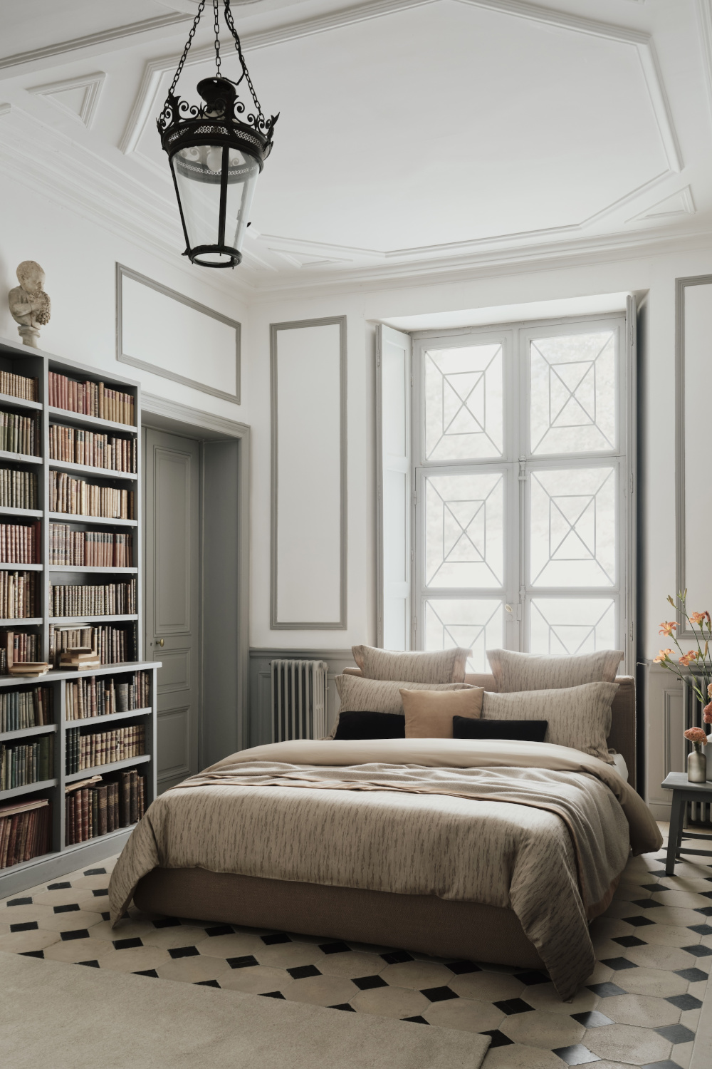 Bedroom with library shelves