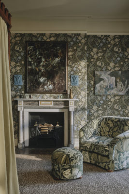 Green wallpapered living room | wallpaper trends 2026