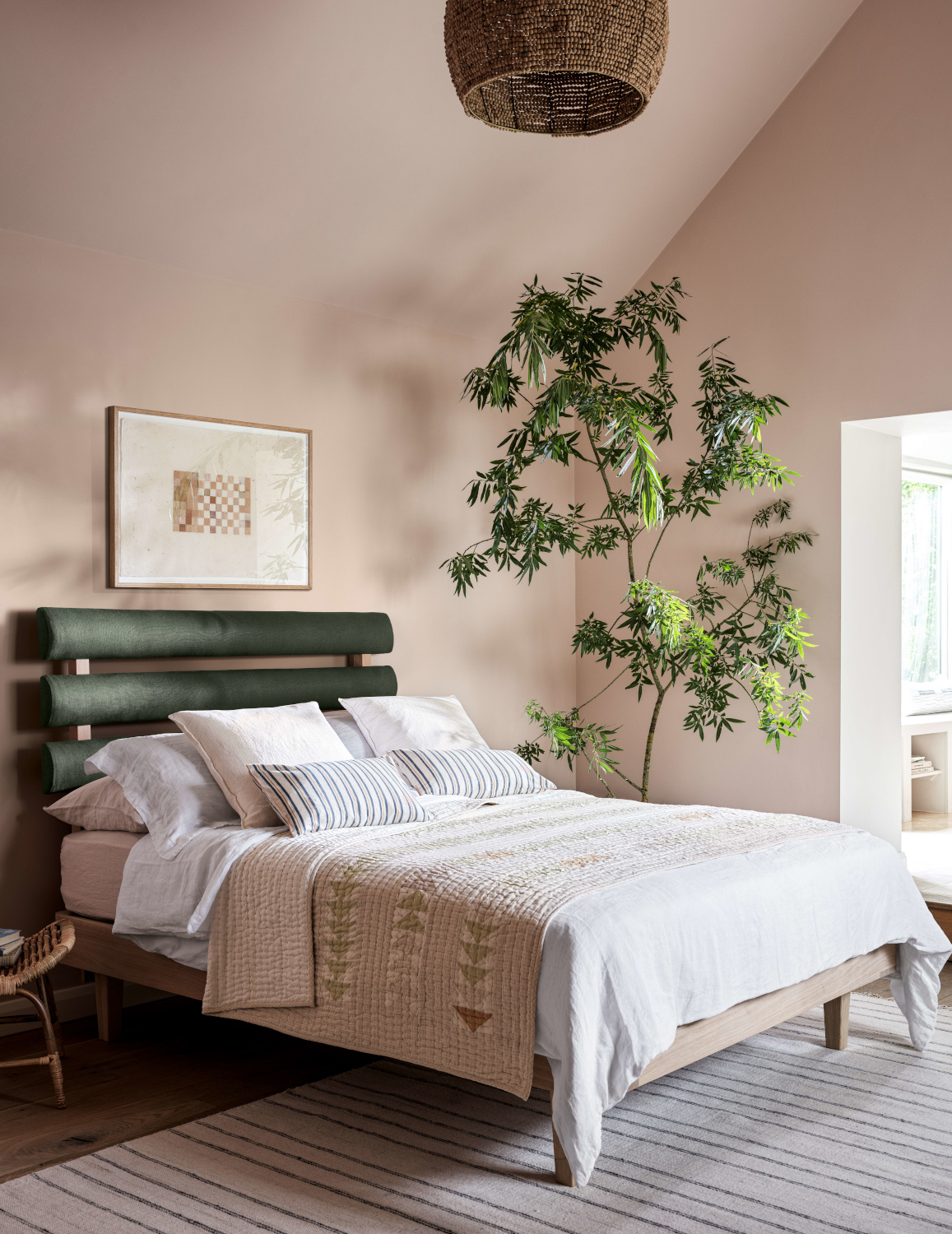 Bed with green headboard