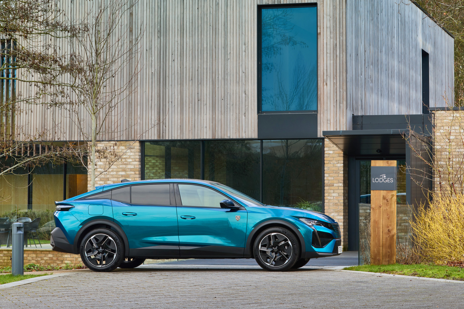 The Peugeot e-408 GT in blue