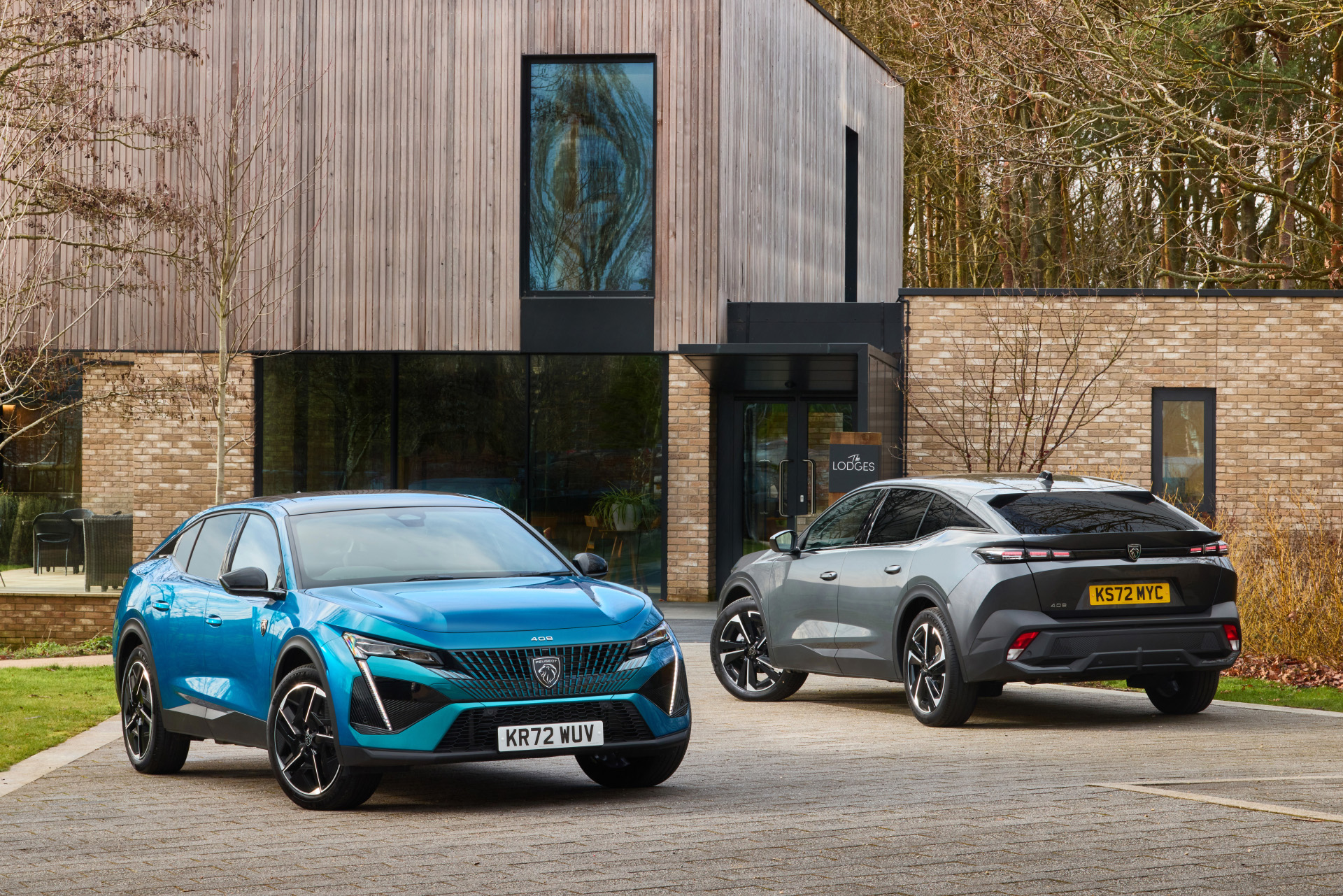 The Peugeot e-408 GT in blue and grey