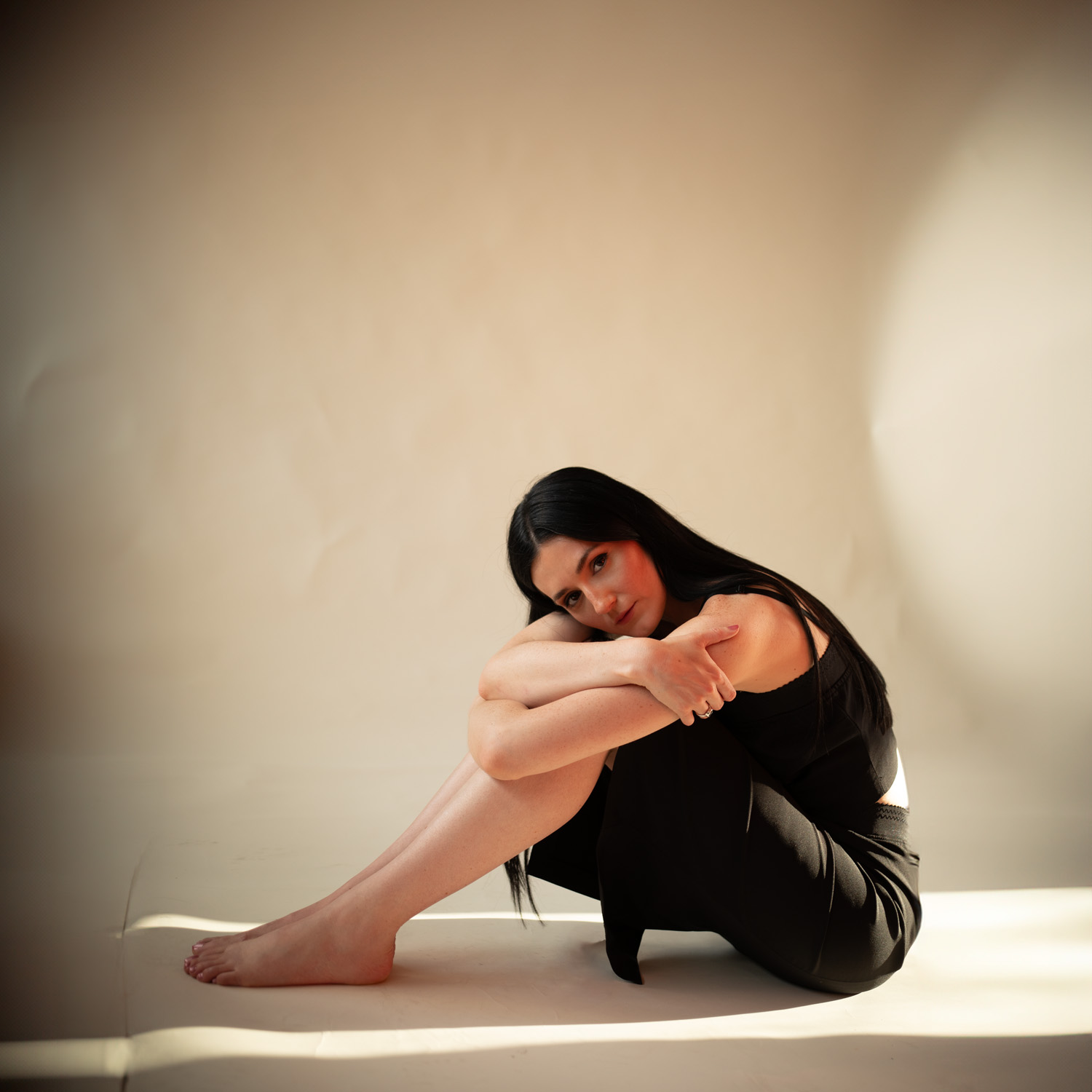 Posy Sterling wearing a black dress