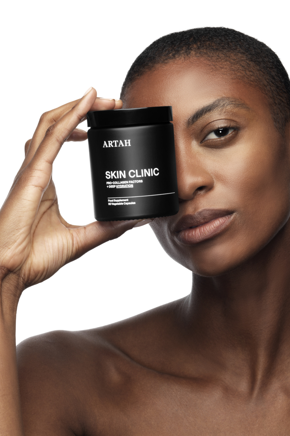 Model holding ARTAH bottle