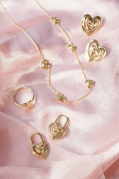 Jewellery on pink satin fabric