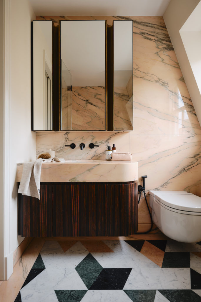 Pink bathroom with tile floors