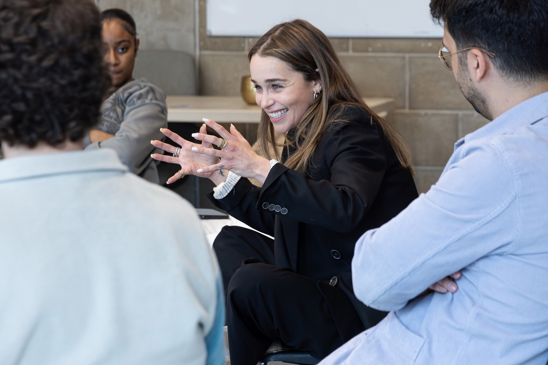 Open Door ambassador Emilia Clarke running an acting workshop.
