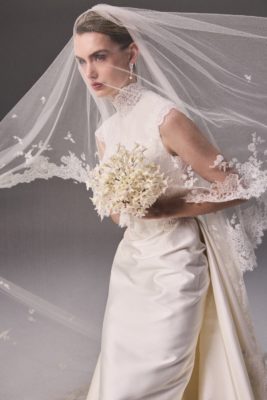 Woman wearing wedding dress and veil