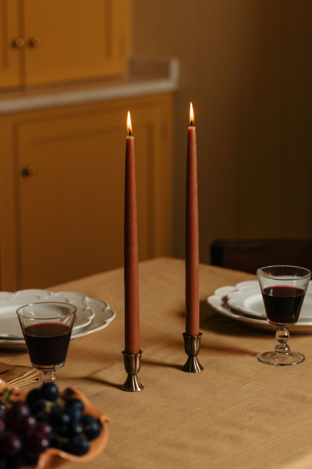 Two candles set on table