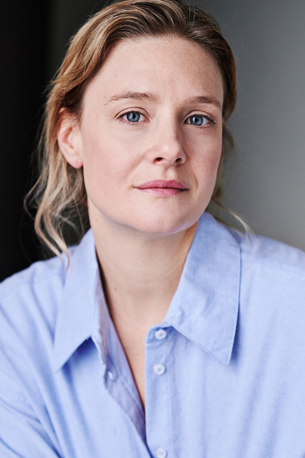 A headshot of Romola Garai