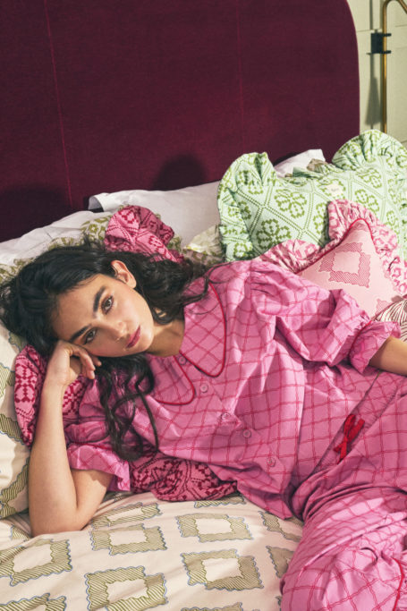 Woman in pink pyjamas