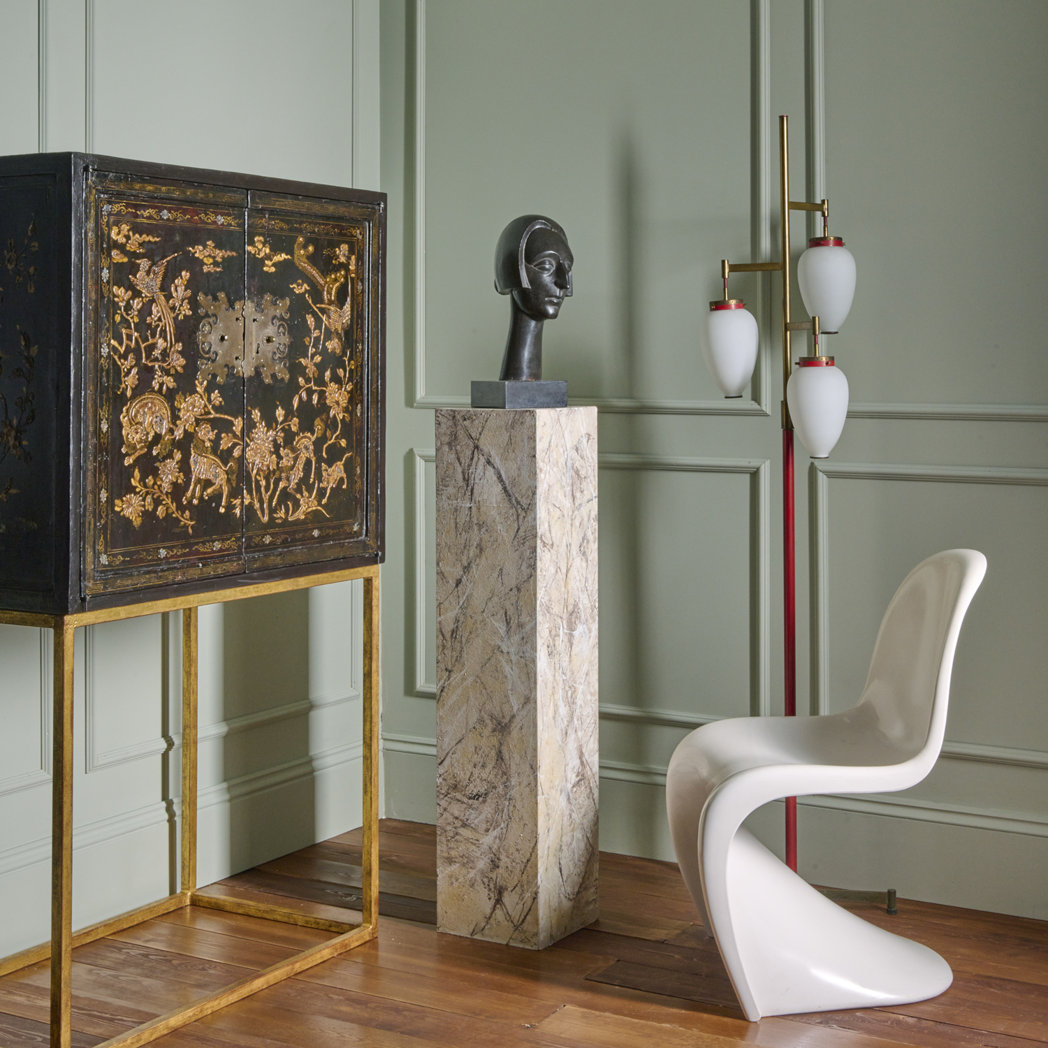 Furniture from different time periods set up in same room