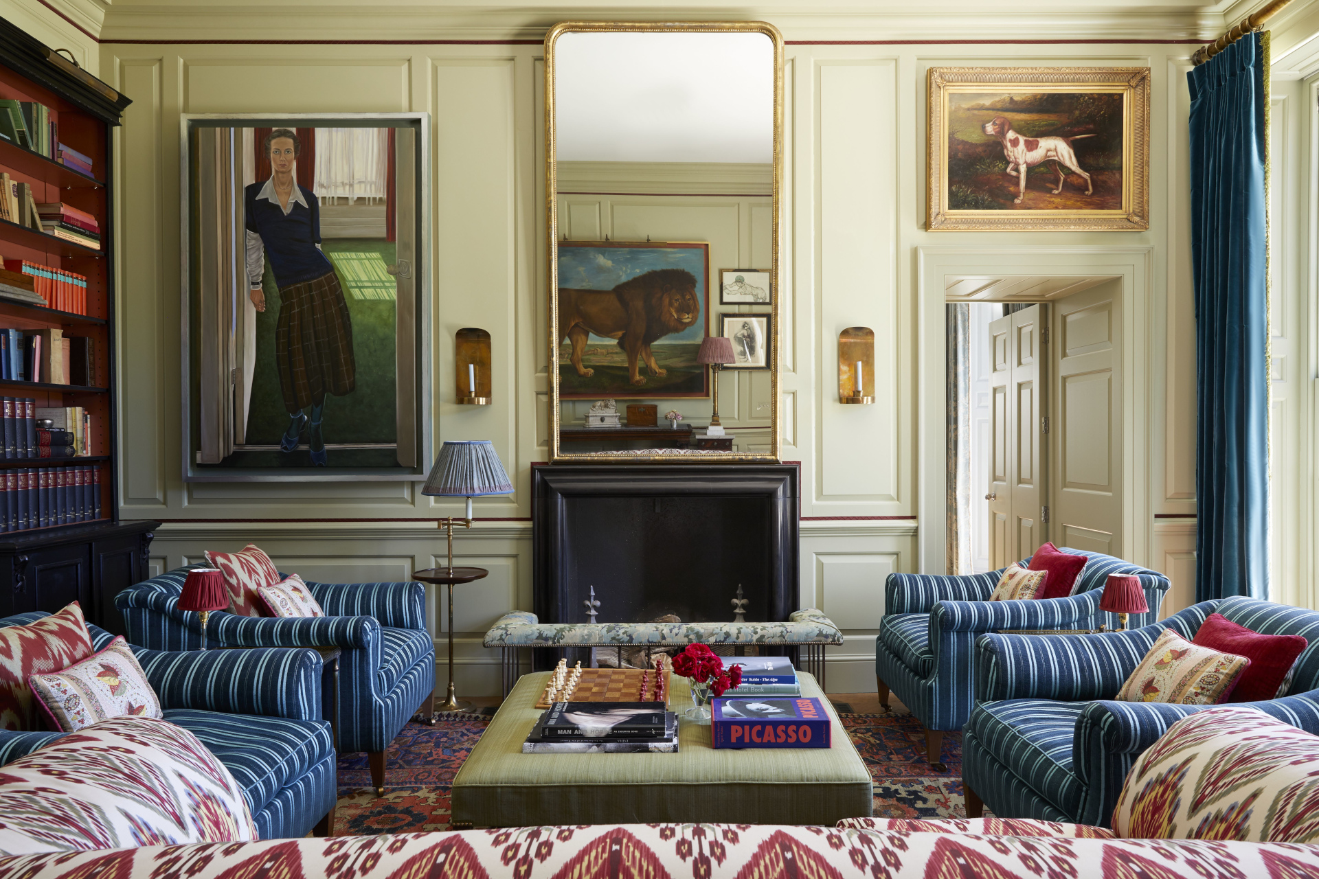 Living room with colourful sofas and wall art