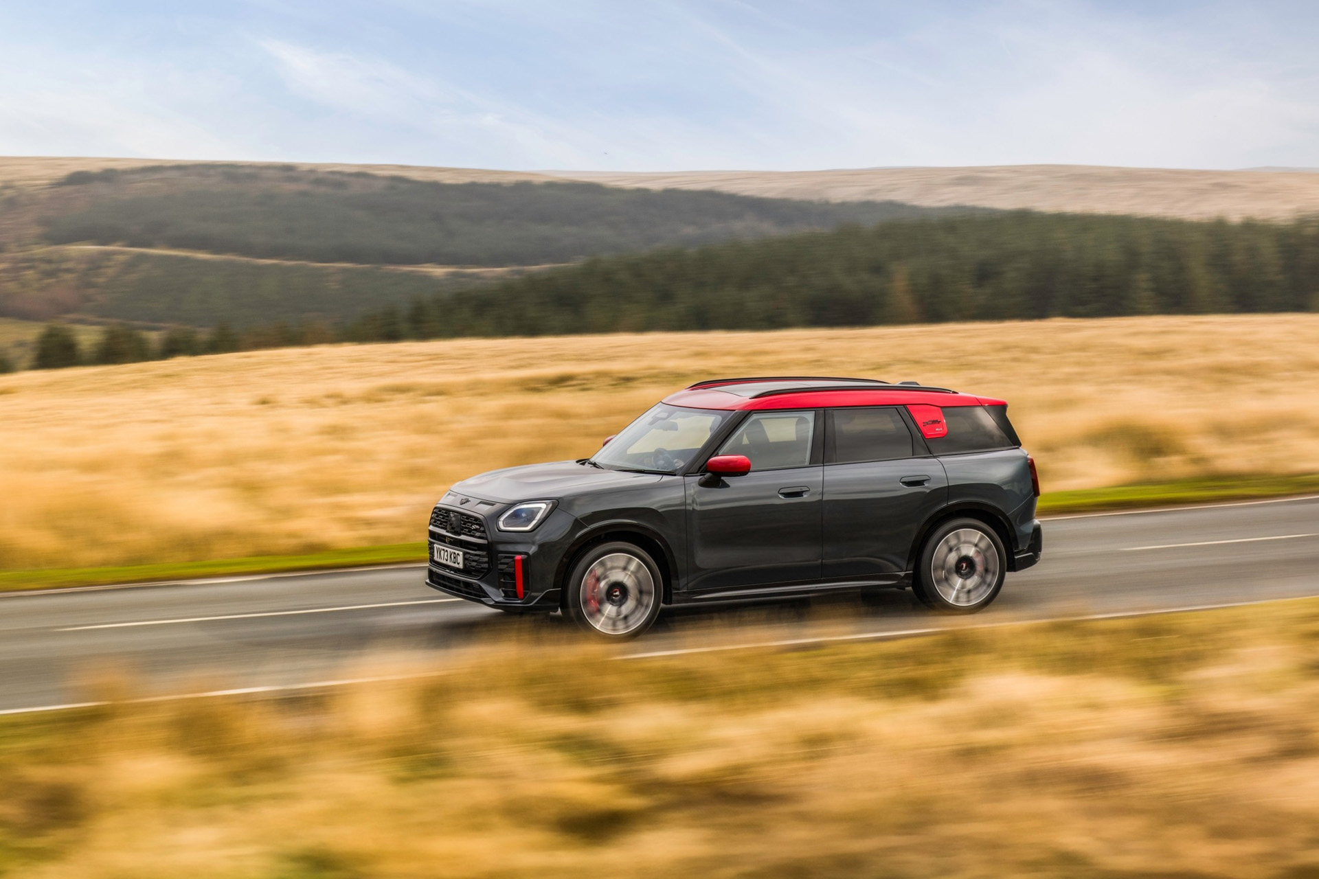 The side of the Mini Countryman John Cooper Works Electric in motion