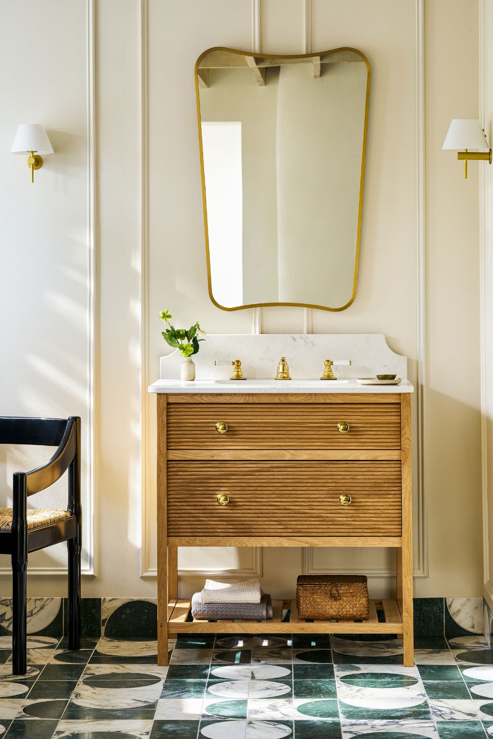Mirror, sink and vanity with tile floors