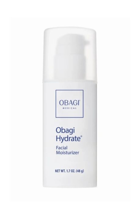 Skin cream in white bottle