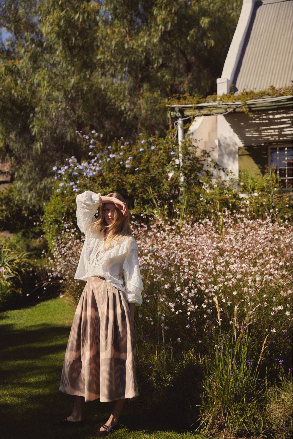Woman stood in garden