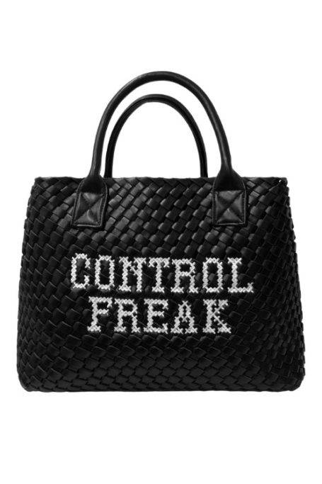 Black bag embroidered with the words 'control freak'