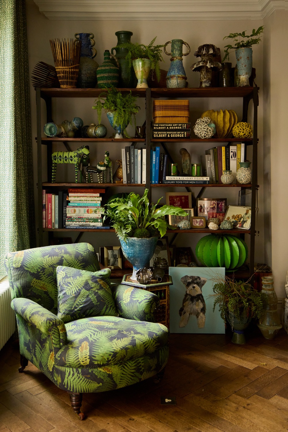 Reading corner with green armchair
