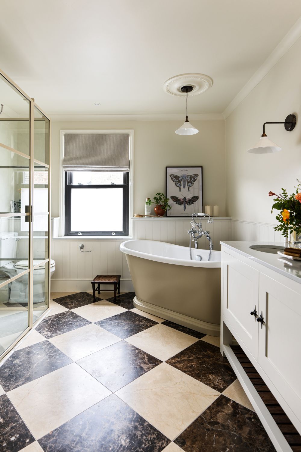 Bathroom with black and white check floor