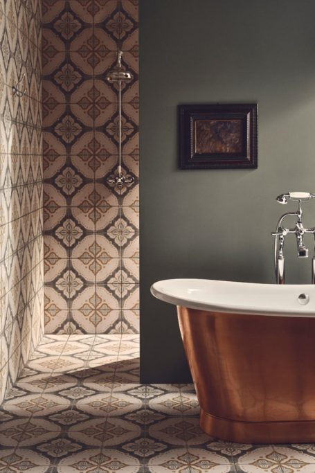 Bath with tiled floor and wall