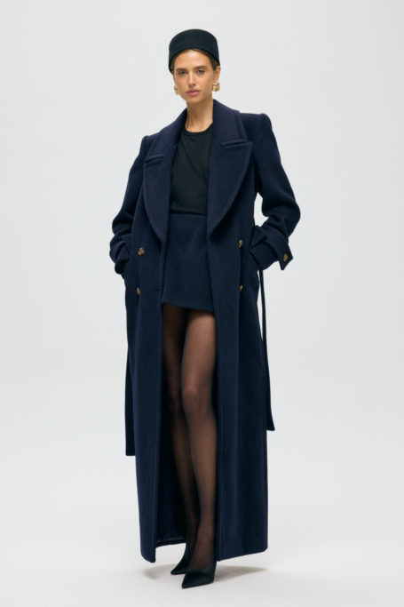 Woman wearing black outfit from STPLE