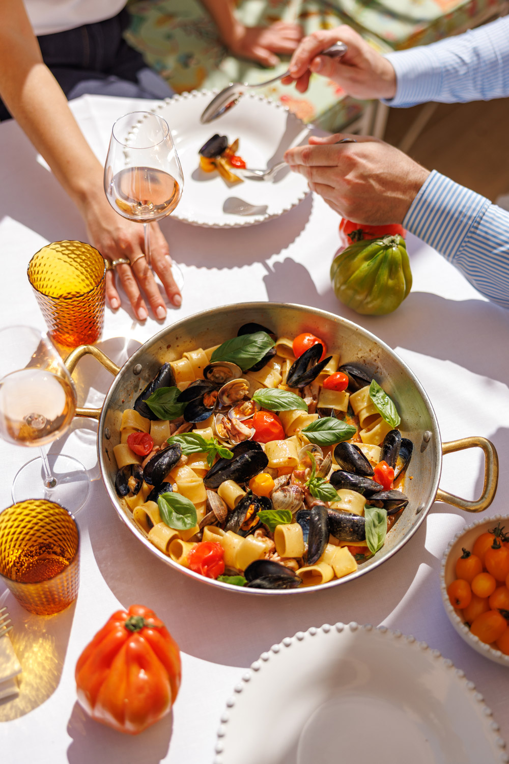 Pasta on a table outside at Casa Monti, Rome