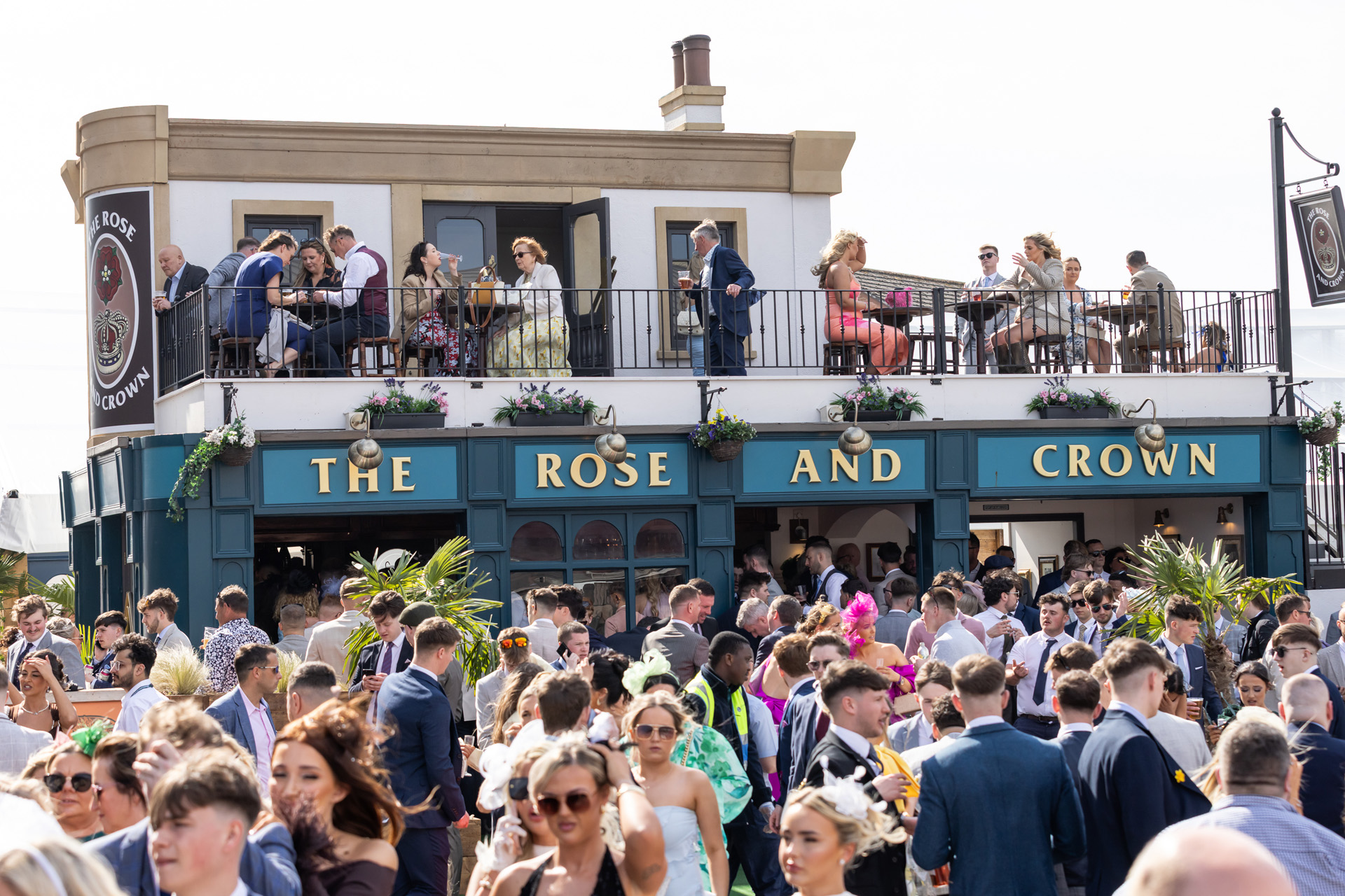 Crowds at the Rose & Crown pub at the Grand National