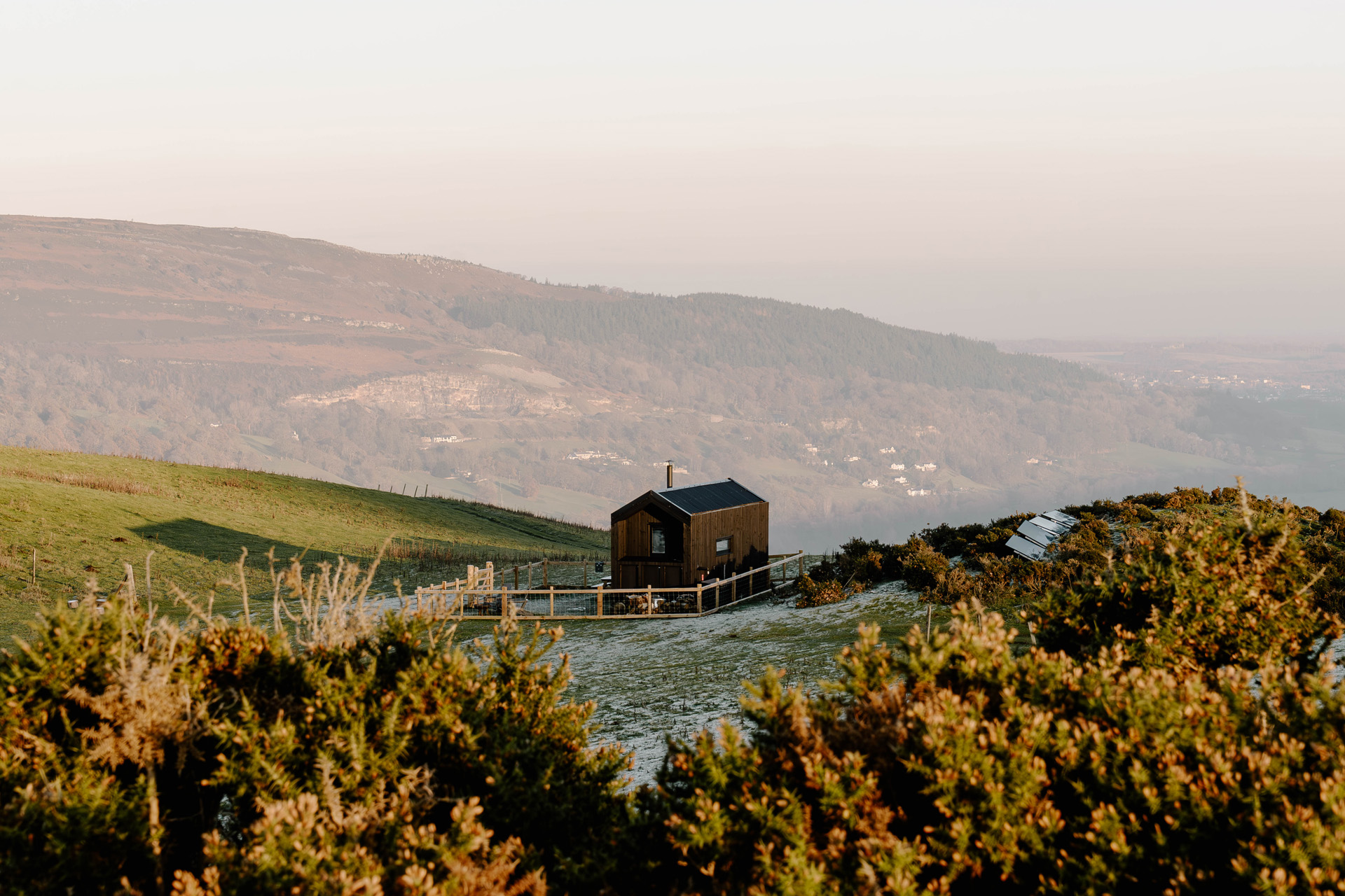 An off-grid cabin surrounded by countryside