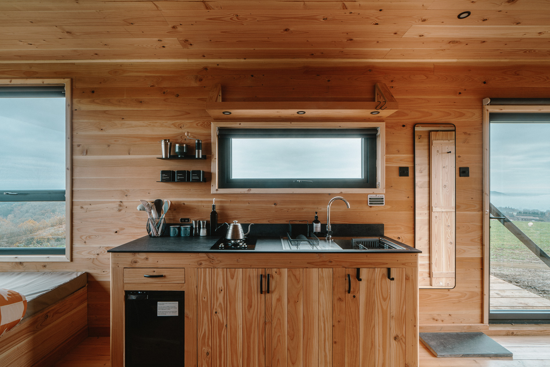 A small kitchen in a log cabin