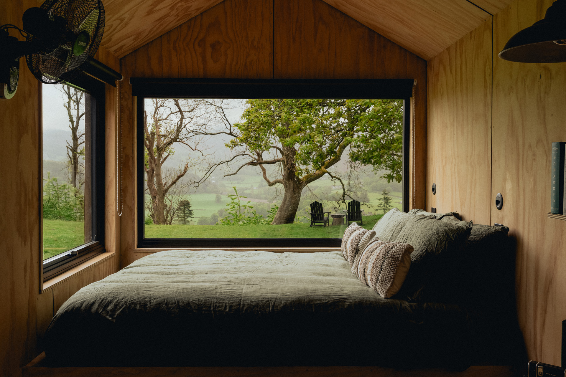 A double bed in a small cabin
