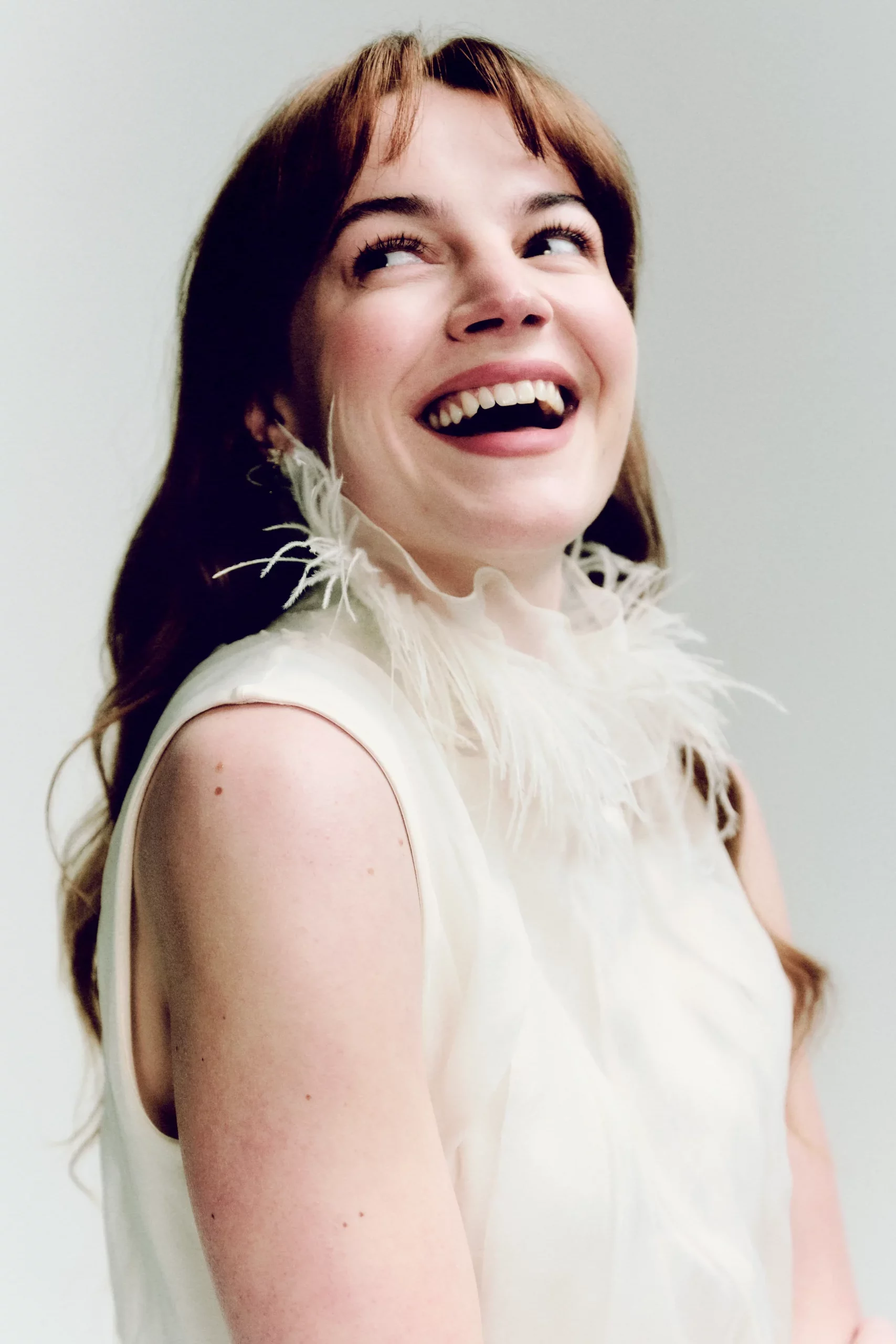 Izzy Meikle-Small in a white blouse