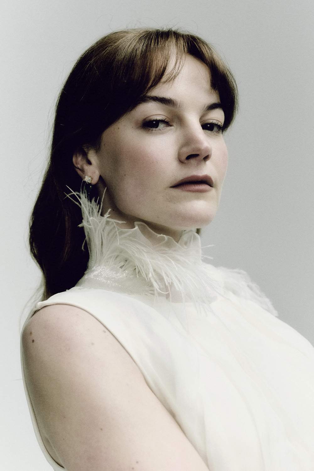 Izzy Meikle-Small in a white blouse