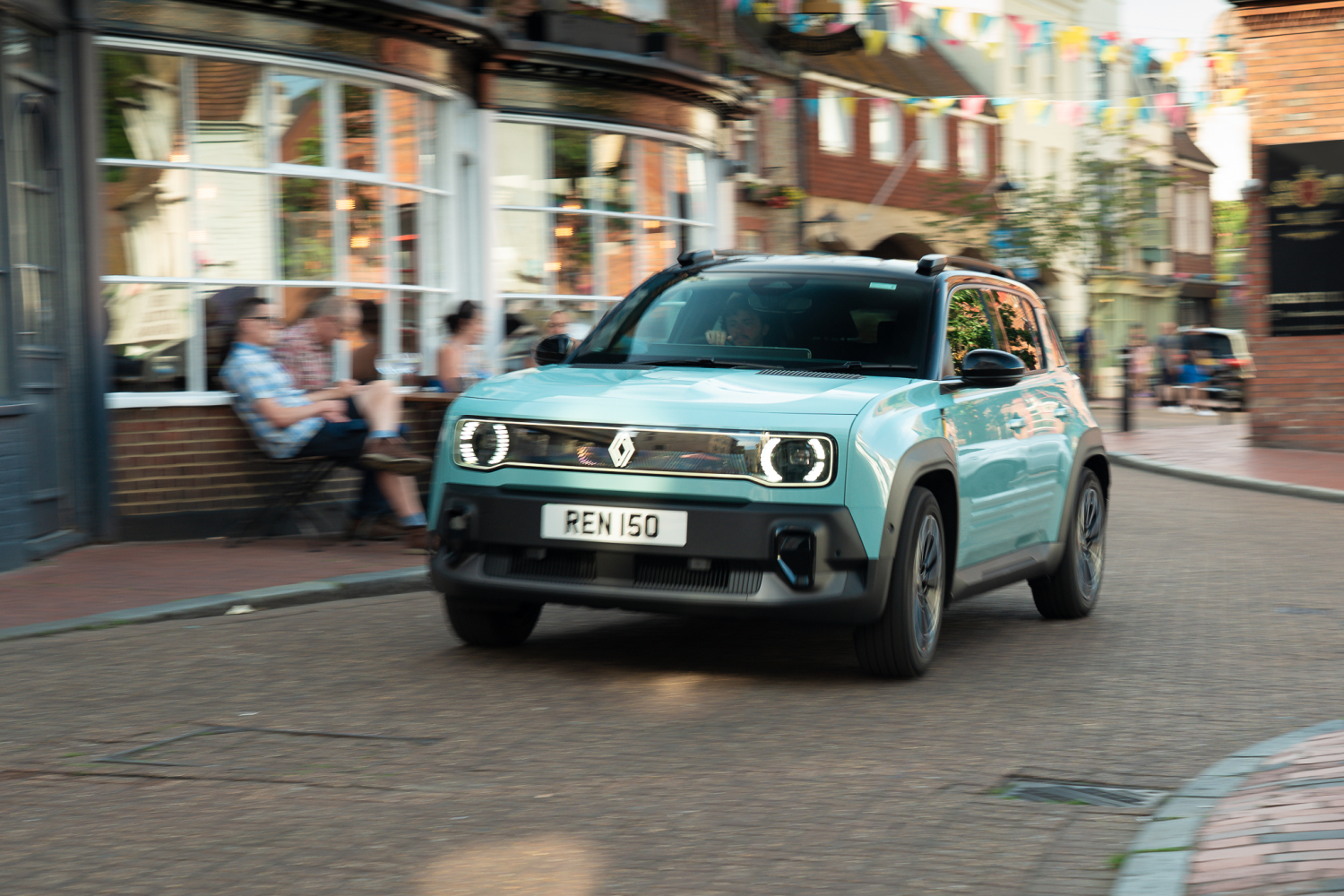 Renault 4 E-Tech on a town road