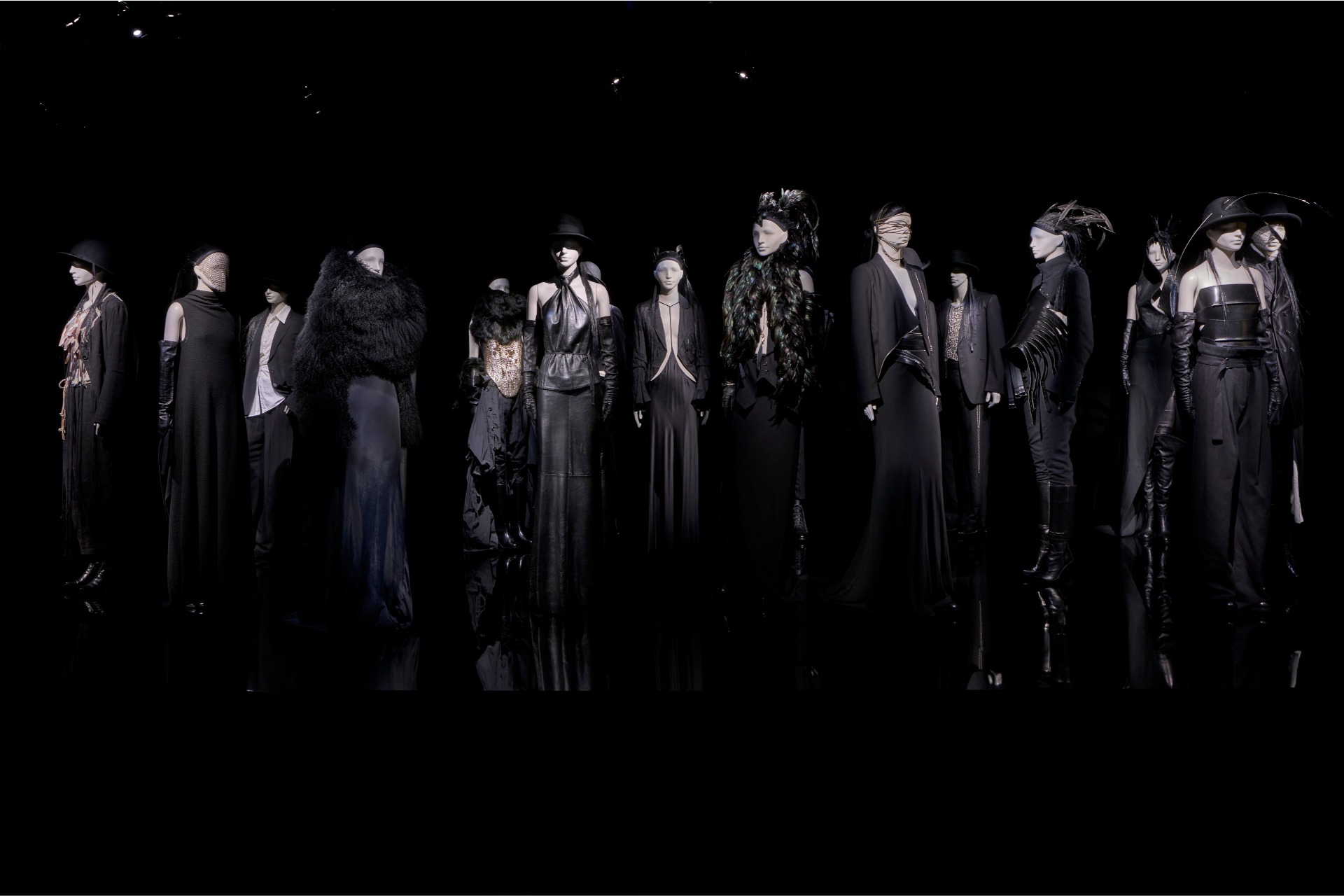 Black outfits in dark room | global fashion exhibitions